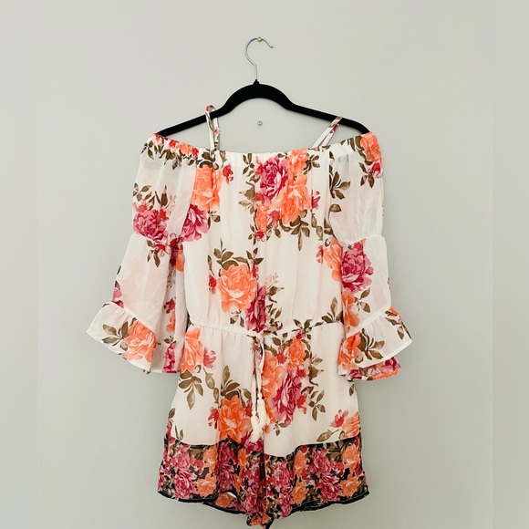 Floral Long-Sleeved Romper - Picture 1 of 5